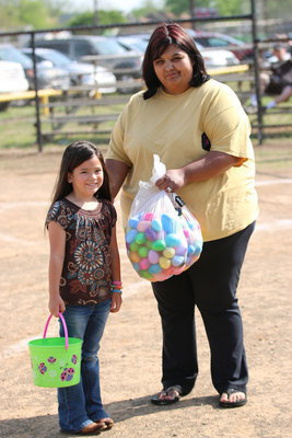 Image: Nelda Carr and her new hair-doo with her daughter Hannah Carr and a full bag of Easter eggs.