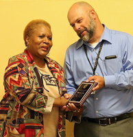 Image: For dedication and service to the Italy ISD students when a void in the classroom needed to be filled with reliability, Principal Lee Joffre presents Elmerine Bell with a personalized appreciation plaque.