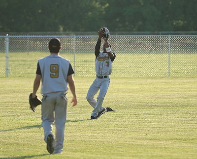 Image: Eric Carson(3) was in collection mode in centerfield after getting a glove under a few Wampus Cats popups.