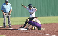 Image: Lady Gladiator Tara Wallis(5) makes it to third base safely with Mart unable to make the tag during a class A bi-district clash in Corsicana.
