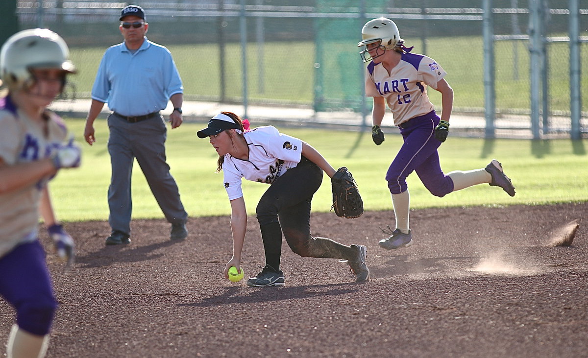 Image: Lady Gladiator Bailey Eubank(1) knocks down a grounder and then tosses the ball to teammate Madison Washington for a force out at second.