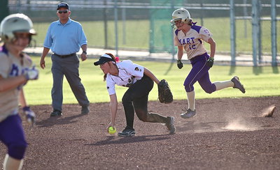 Image: Lady Gladiator Bailey Eubank(1) knocks down a grounder and then tosses the ball to teammate Madison Washington for a force out at second.