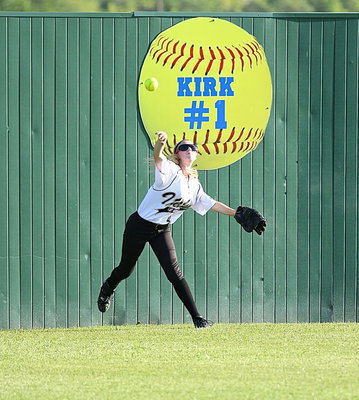 Image: Left Fielder Britney Chambers(4) launches the ball back to the infield with Mart peppering the outfield early in the contest.