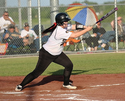 Image: Paige Westbrook(10) with another big hit for the Lady Gladiators.