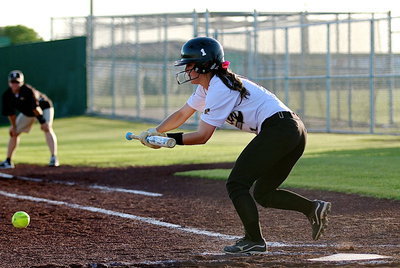 Image: Bailey Eubank(1) executes a bunt for the Lady Gladiators.