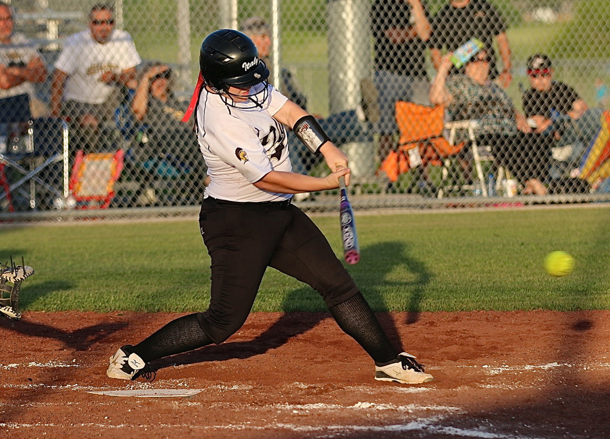 Image: Paige Westbrook(10) injures Mart’s pitcher with this driver back to the mound.