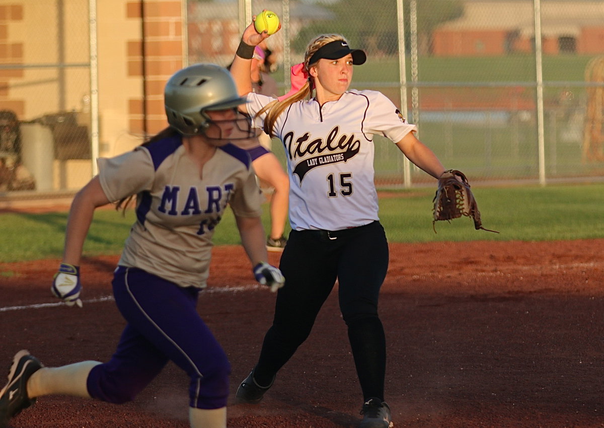 Image: Jaclynn Lewis(15) catches a short popup and then throws to first-base to get another Lady Panther runner out before she could tag back up. Double-play!