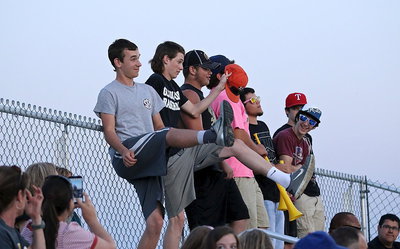 Image: Gladiator Baseball players Ryan Connor and Ty Windham lead the cheers for the Lady Gladiators.