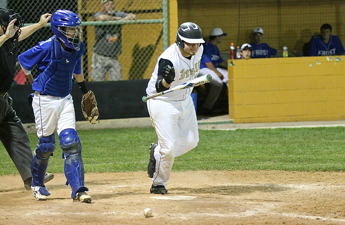 Image: Kevin Roldan(16) is hit with the ball, again, while still healing from a bruised cheek after taking a pitch to the face earlier in the season.