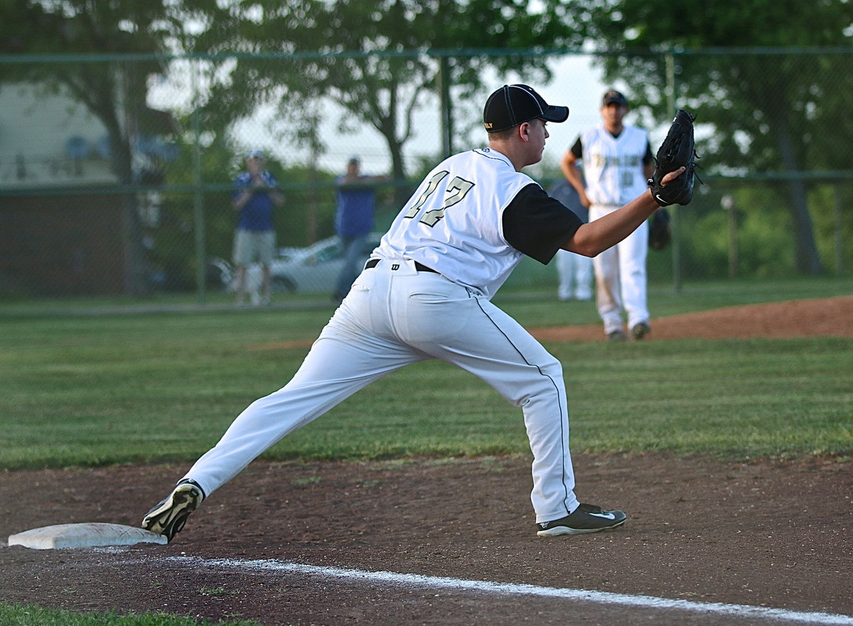 Image: Bailey Walton(17) makes the catch for another out at first-base.