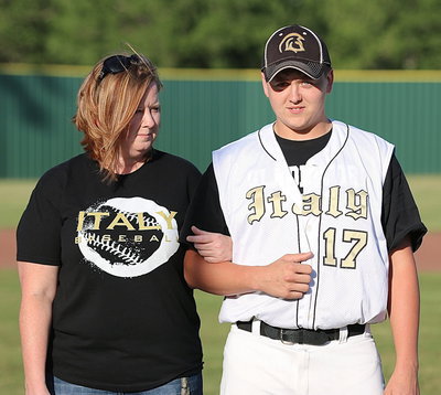 Image: Gladiator Baseball senior Bailey “Biscuit” Walton(17) is proudly escorted out by his mother, Michele Richards Walton, for Bailey’s final home game at Davidson Field in Italy.