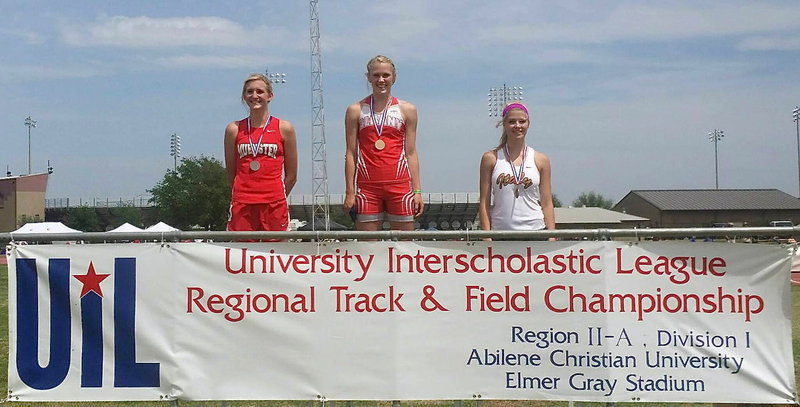 Image: Italy Lady Gladiator sophomore Halee Turner (Right) is presented her bronze medal in high hurdles after posting a 3rd Place time of 15.90 during the UIL Regional Track And Field Championship in Abilene at the Abilene Christian University campus.