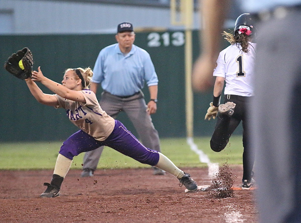 Image: Close…very close. Bailey Eubank(1) tries to represent the game-tying run for Italy but the close call goes Mart’s way.