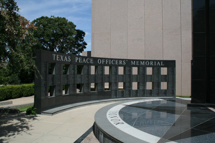 Image: The Texas Peace Officers’ Memorial located on the grounds of the Texas State Capital in Austin, Texas. The memorial lists the names of all Texas Peace Officers who have given their lives in the line of duty.