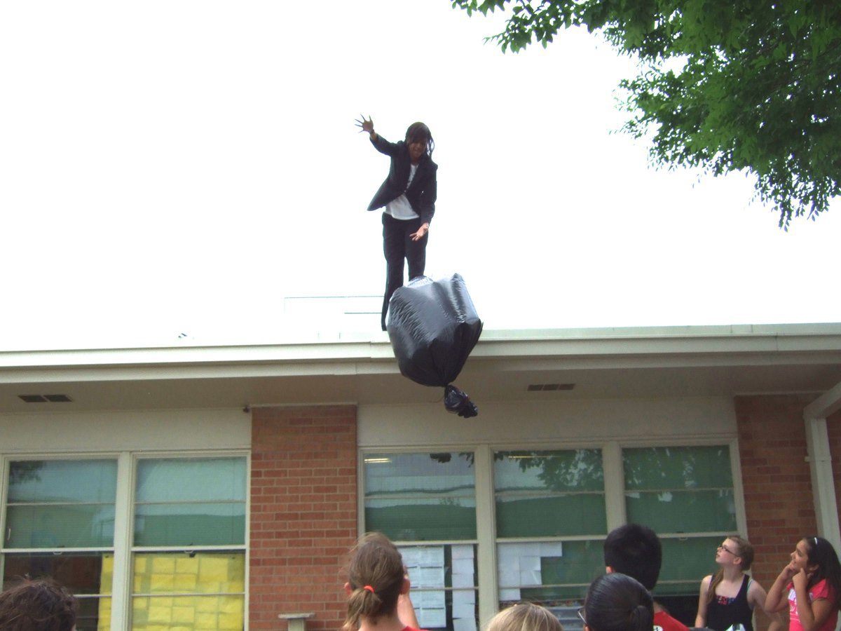 Image: Pamela Thomas dropping the egg.