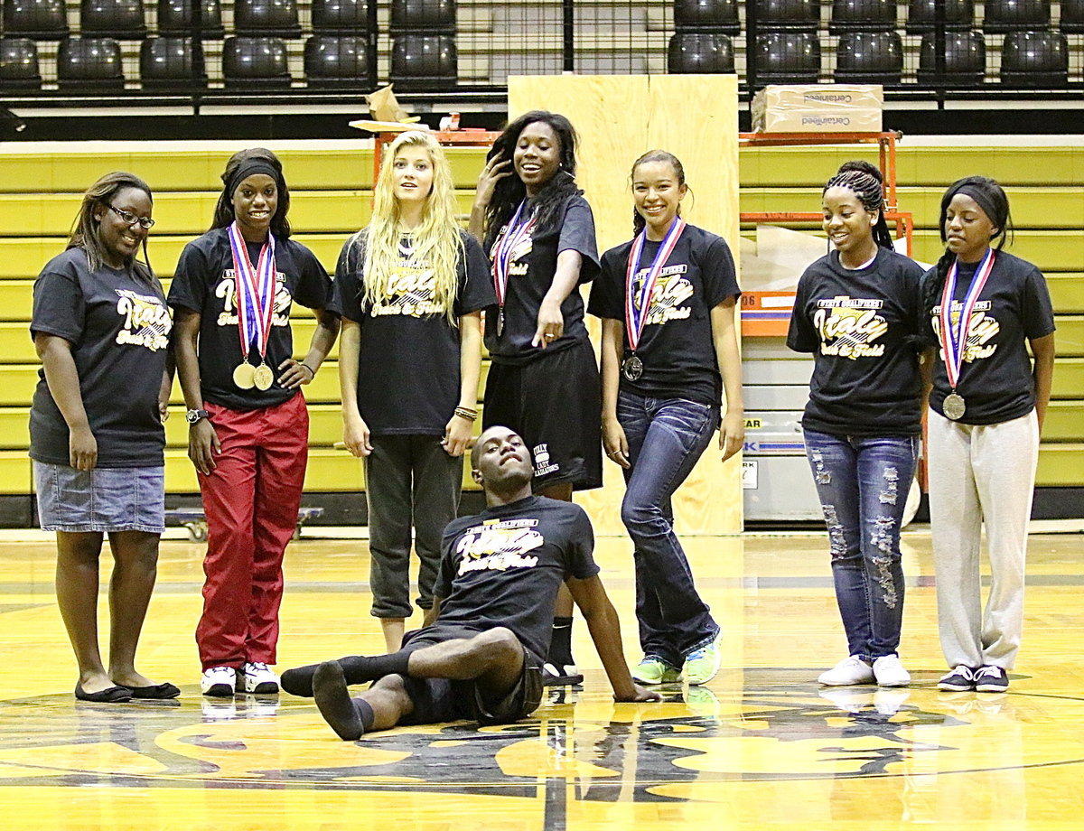 Image: TaMarcus Sheppard thinks he is the prize as he and Brenya Williams, Kortnei Johnson, Halee Turner, Janae Robertson, April Lusk, Bernice Hailey and Kendra Copeland have some fun during the photo shoot.