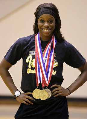 Image: Junior Kortnei Johnson helped bring home the silver medal as a part of Italy’s Girls Sprint Relay team, as well as, a pair of gold medals in the 200m Dash and in the 100m Dash.