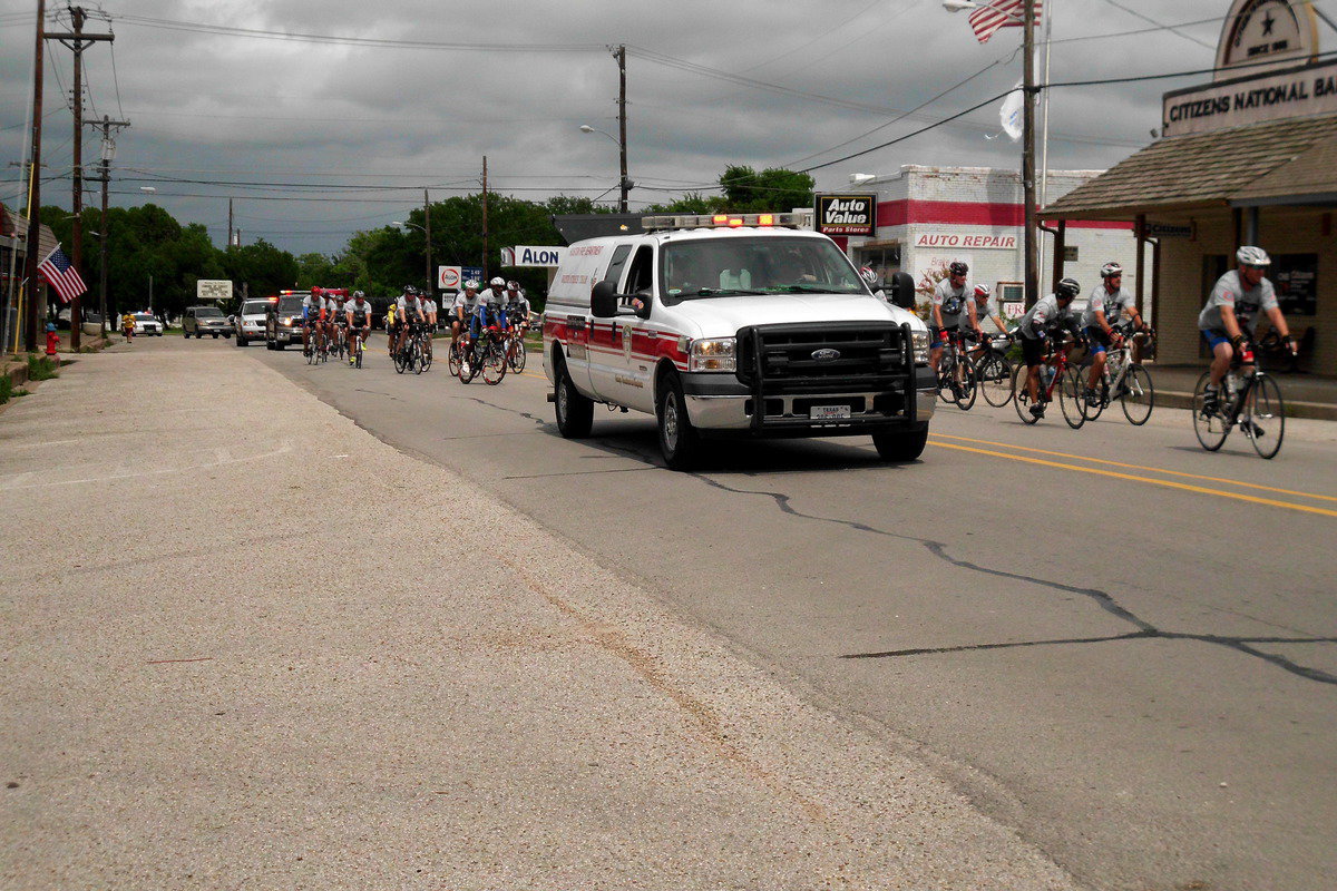 Image: The Brotherhood Riders arrive in downtown Italy to honor Greg Pickard.