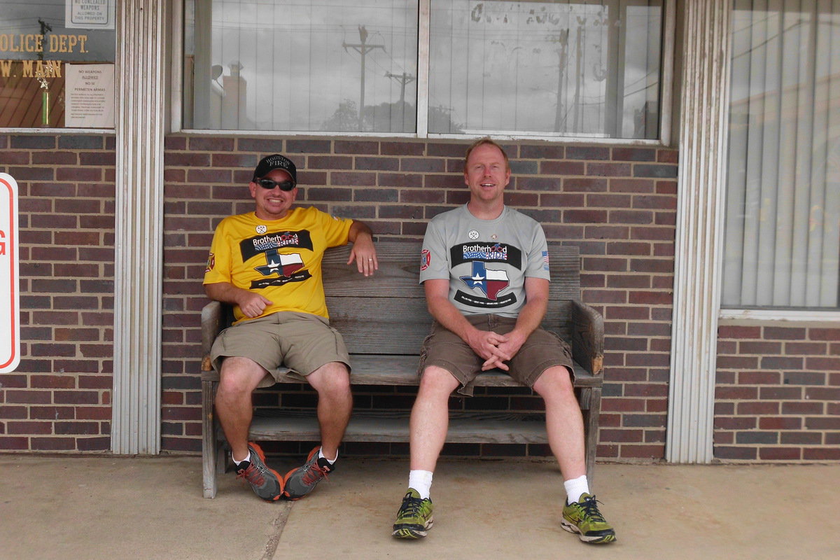 Image: Support staff waits on the riders.