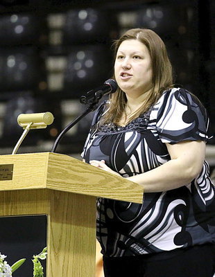 Image: Italy High School Guidance Counselor Erica Miller welcomes the 2014 graduating seniors and guests to the Senior Scholarships and Awards Program held inside Italy Gladiator Coliseum on May 15.