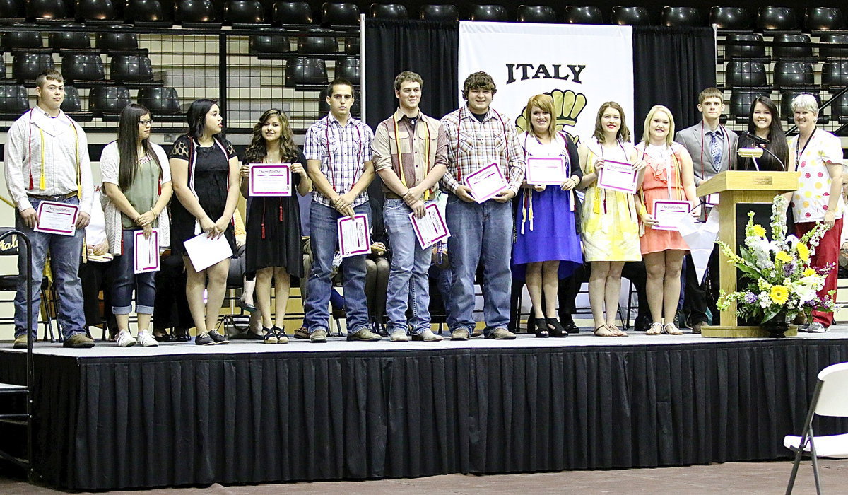 Image: DeeDee Hamilton (far right) presents Carter BloodCare Honor Cords to Zain Byers, Adriana Celis, Monserrat Figueroa, Jessica Garcia, Cody Medrano, Joseph Pitts, Kevin Roldan, Emily Stiles,  Taylor Turner, Jesica Wilkins, Justin Wood and Paige Westbrook.