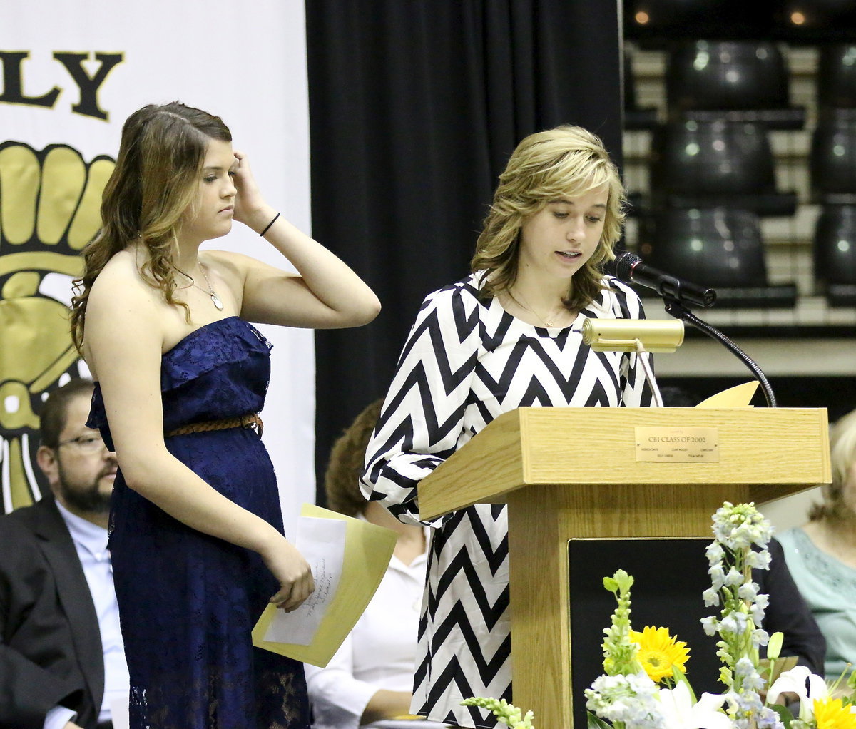 Image: Sisters Grace Haight and Hannah Haight prepare to announce the first recipient of the Marty Haight Memorial Scholarship which was created to remember their father and how much he cared about kids.