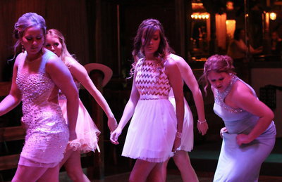 Image: Madison Washington, Hannah Washington, Jozie Perkins and Tia Russell are getting down during some line dancing.