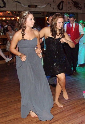 Image: Brooke DeBorde and Lillie Perry join in on the fun as they try to keep time with the Cotton-Eyed Joe.