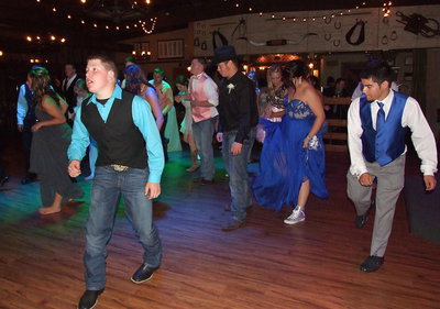 Image: John Escamilla and Tyler Anderson set the bar for line dancing.