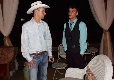 Image: Ryan Connor and Levi McBride are probably talking about baseball even though its prom night.