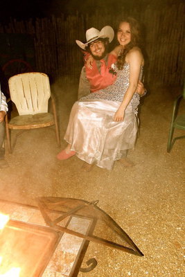 Image: Kyle Fortenberry and Ashtyn Mondy enjoy the campfire under the moonlight.