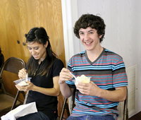 Image: Johnny Campos and Andrew McCasland have some laughs along with thier scoops of ice cream during the social.