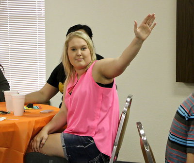 Image: Jesica Wilkins thinks she has the answer to a question during the survival game.