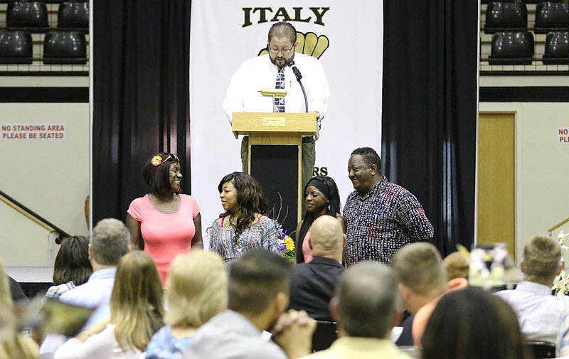 Image: In recognition of Italy’s 2013-2014 senior student-athletes, cousins Ryisha Copeland and Kendra Copeland are introduced while being escorted by family.