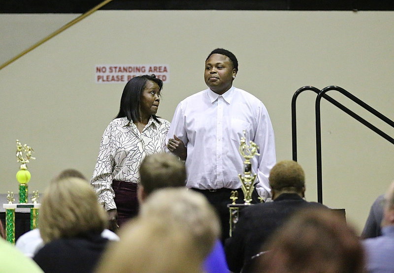 Image: In recognition of Italy’s 2013-2014 senior student-athletes, Darol Mayberry is introduced while being escorted by his mother.