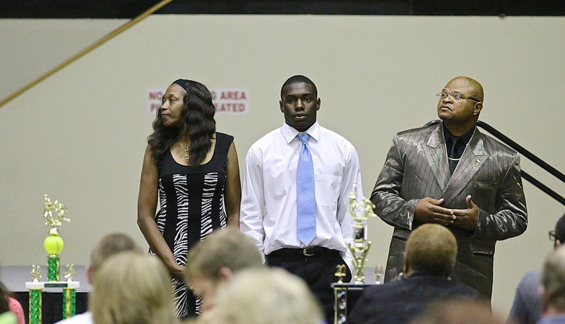 Image: In recognition of Italy’s 2013-2014 senior student-athletes, TaMarcus Sheppard is introduced while being escorted by his parents.