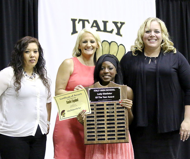 Image: Kendra Copeland is named Lady Gladiator of the Year and is presented the award by coaches Tina Richards, Morgan Mathews and Melissa Fullmer.