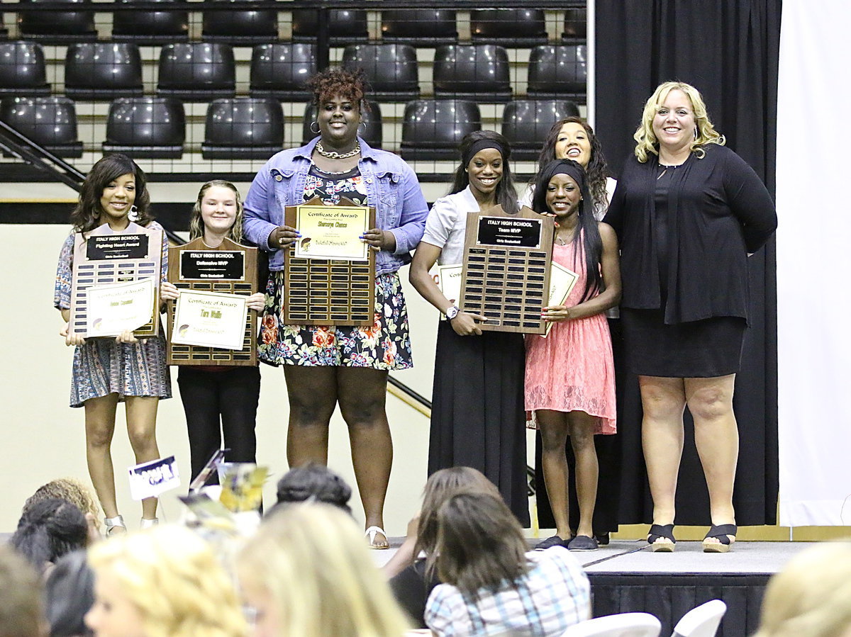 Image: Coaches Tina Richards and Melissa Fullmer (on the far right) pose with Lady Gladiator Basketball  award winners Ryisha Copeland (Fighting Heart Award), Tara Wallis (Defensive MVP), Shercorya Chance (Offensive MVP) and the combination of Kortnei Johnson and Kendra Copeland who were the team’s Co-MVPs.