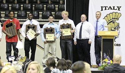Image: For boy’s Basketball, the R. Lewis Team MVP Award went to Trevon Robertson,
    Offensive MVP went to TaMarcus Sheppard, Defensive MVP went to Tyler Anderson and the Fighting Heart Award was presented to Cody Boyd with Head Coach Brandon Ganske and Assistant Coach Jon Cady making the presentations.