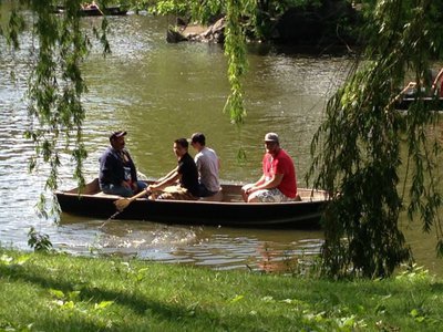 Image: Blake Brewer, Hunter Wood, Eli Garcia take turns rowing for Albert Garcia around the lake in Central Park.