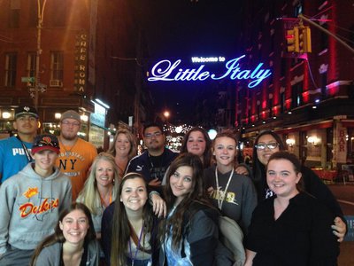 Image: The group thought it would be fitting and appropriate to take a picture in front of the Little Italy marquee.