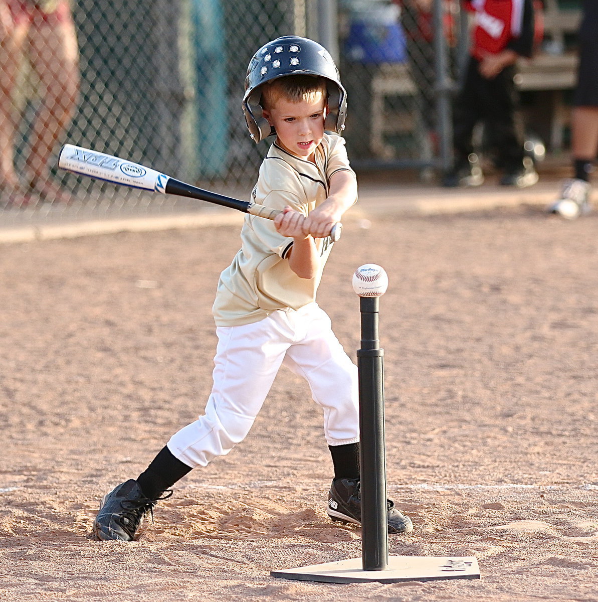 Image: Rowan Joffre(6) is determined to knock the cover off that defenseless ball.