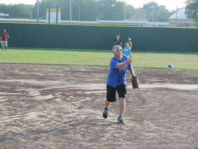 Image: Micheal Chambers, 1st Baptist Youth Minister, sends one over the plate.