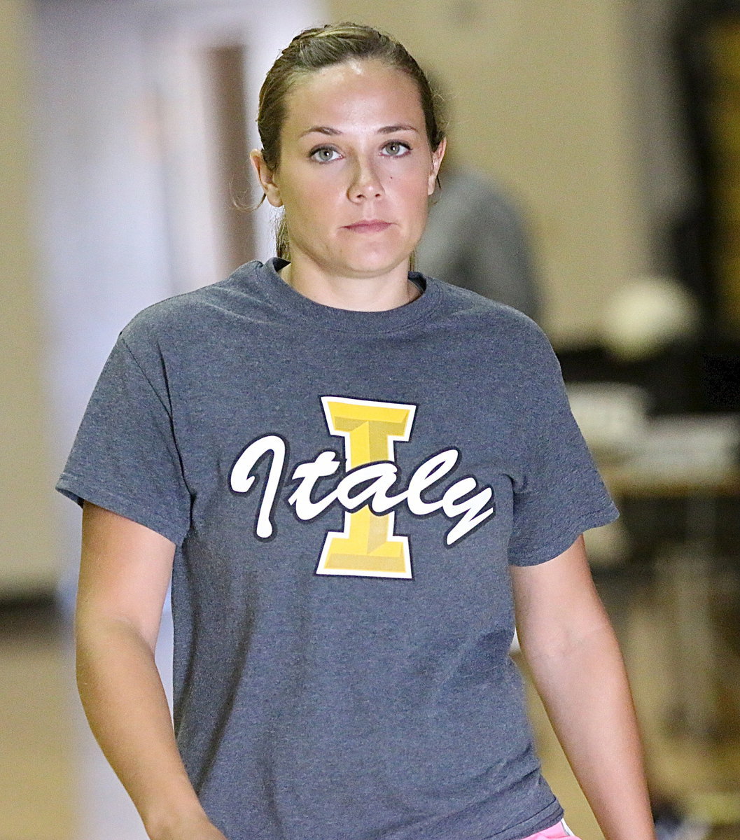 Image: Assistant volleyball coach Holly Bradley has her serious face on during two-a-day workouts.