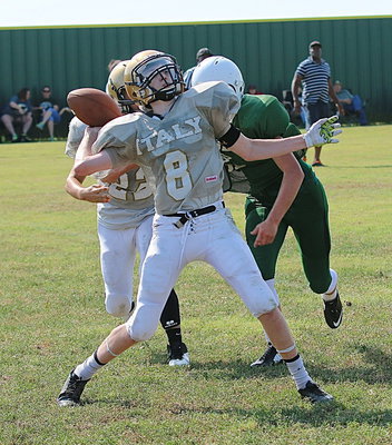 Image: JV Gladiator quarterback Clayton Miller(8) fires a pass out of the pocket.