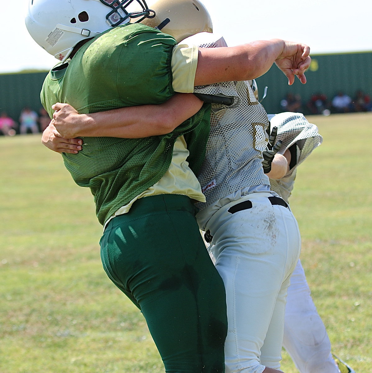 Image: JV Gladiator Clay Riddle(56) pops the Eagle quarterback for good measure.