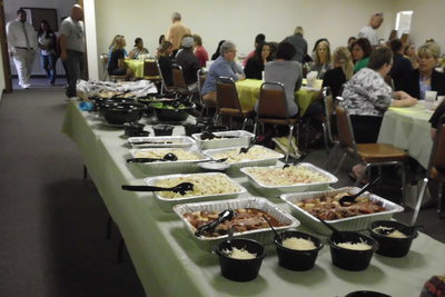 Image: The employees were treated to an Italian meal catered by Johnny Carino’s.