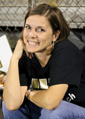 Image: Cheer coach Jenna Chambers is enjoying the game.