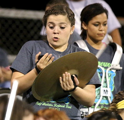 Image: That moment you realize you just broke the cymbol!!! In her excitement, Gladiator Regiment Band member Reagan Adams realizes something very bad has happened.