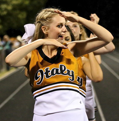 Image: Italy varsity cheerleader Kirby Nelson attempts to vogue the Gladiators to a victory.